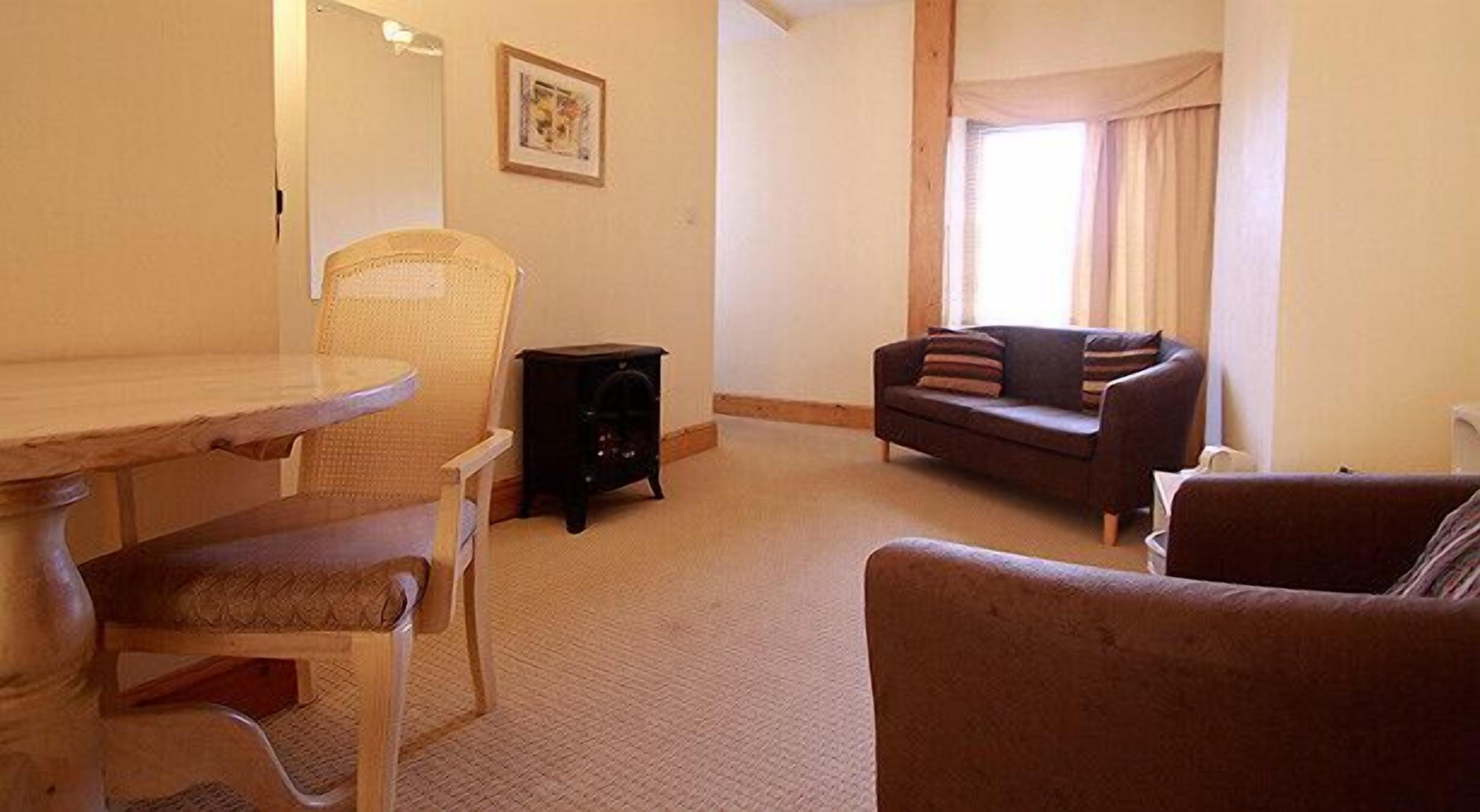 double room, annex building | living area | flat-screen tv