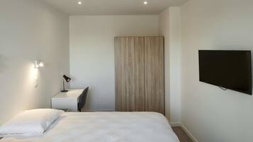 Executive appartement | Hypoallergeen beddengoed, pillowtop-bedden, een kluis op de kamer