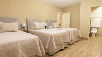 Family Triple Room, 3 Single Beds | In-room safe, desk, iron/ironing board, free WiFi