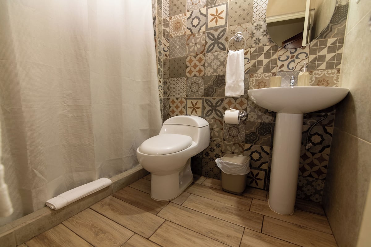 superior double room, 2 double beds | bathroom | shower, free toiletries, hair dryer, towels