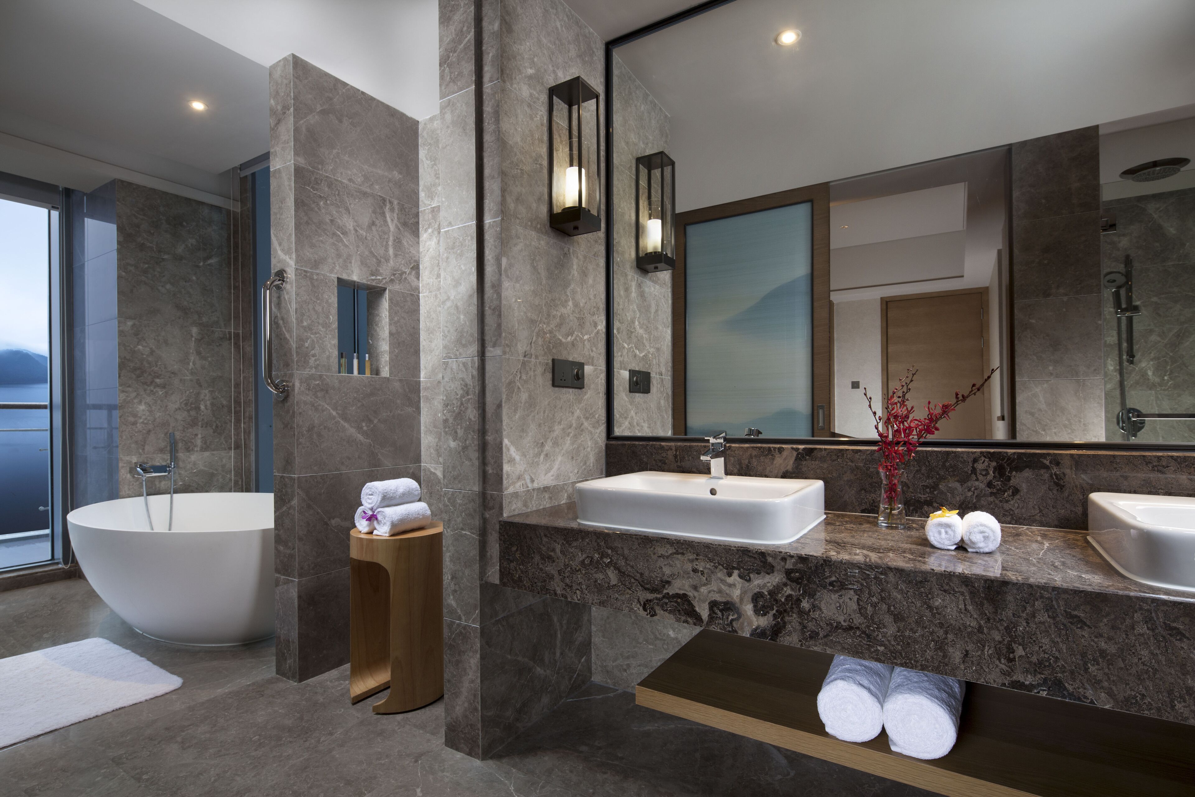1 King 1 Bedroom Premier Club Suite Living Area Lake View | Bathroom | Separate bathtub and shower, rainfall showerhead, bathrobes, towels
