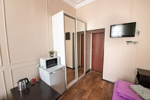 Blackout curtains, iron/ironing board, free WiFi, bed sheets