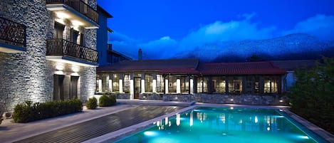 Outdoor pool, pool umbrellas, pool loungers