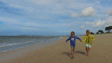 Enjoy a serene beach stroll along the shoreline.
