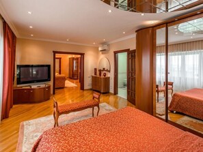 อพาร์ทเมนท์ | เครื่องนอนระดับพรีเมียม, โต๊ะทำงาน, เตารีด/โต๊ะรีดผ้า, Wi-Fi ฟรี