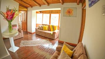 House, 2 Bedrooms | Living area | 21-inch flat-screen TV with cable channels, TV