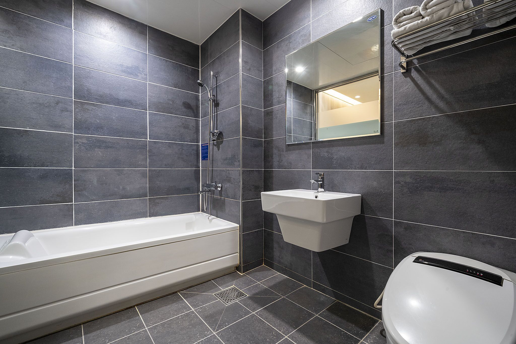 combined shower/bathtub, free toiletries, hair dryer, bathrobes