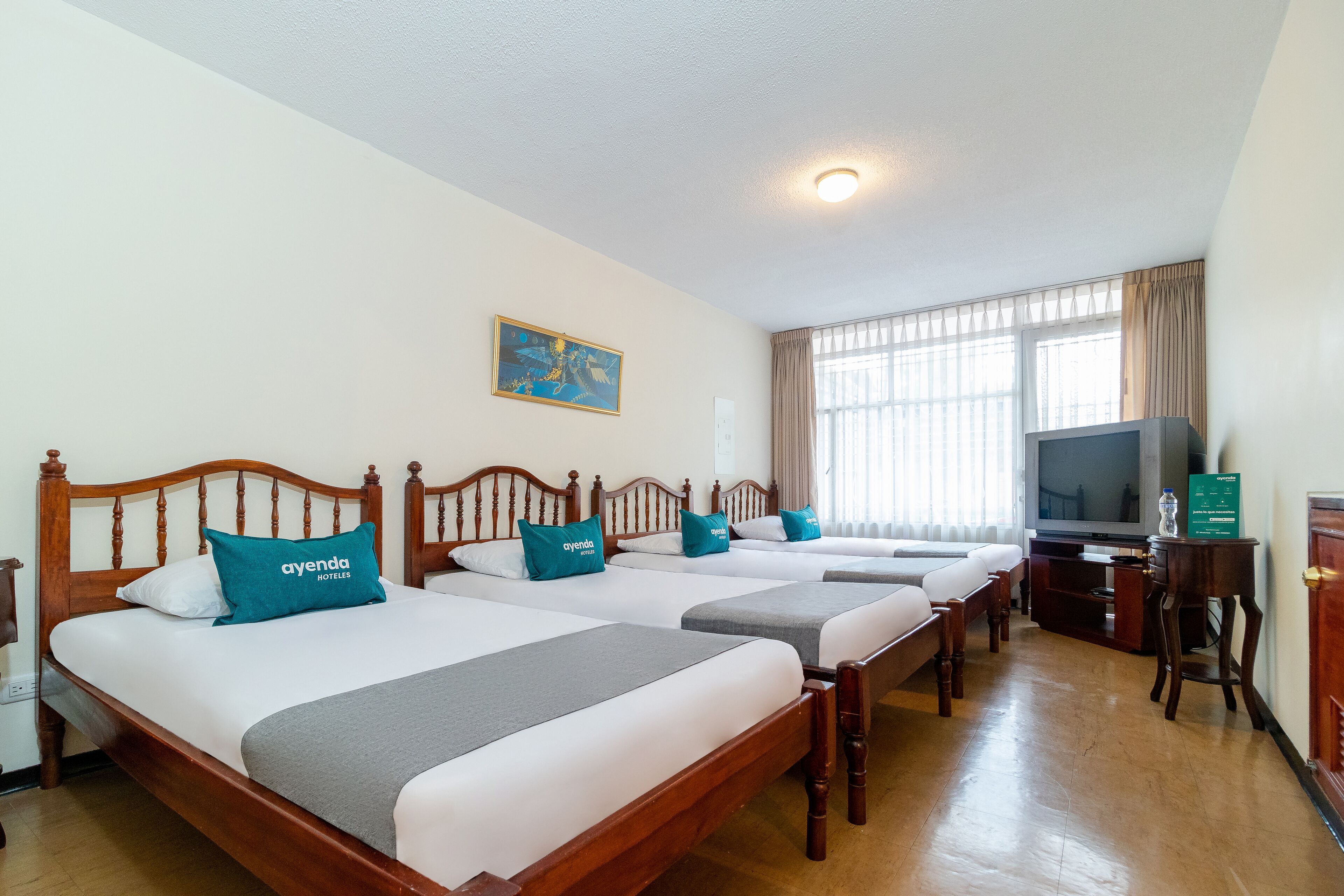 Habitación cuádruple estándar | Wifi gratis y ropa de cama 