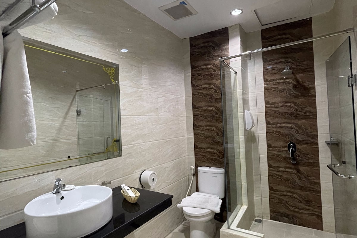 superior double room | bathroom | shower, rainfall showerhead, free toiletries, slippers
