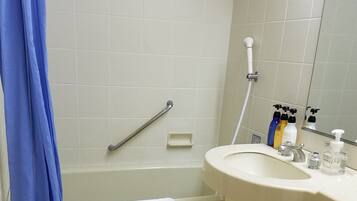 Combined shower/tub, deep soaking tub, hair dryer, slippers