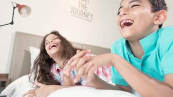 Rover Room - Free DXB Airport shuttle service every one hour to T1 & T3 | In-room safe, desk, soundproofing, free cots/infant beds