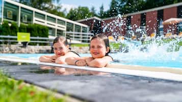 Indoor pool, seasonal outdoor pool, pool umbrellas, pool loungers