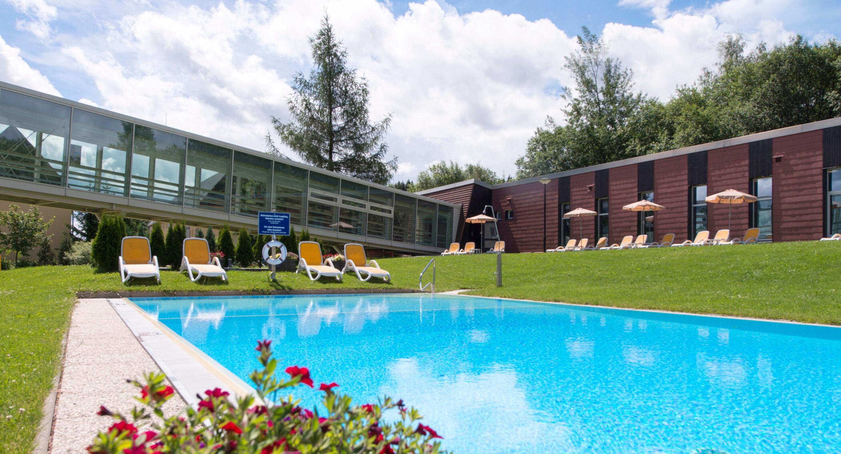 Indoor pool, seasonal outdoor pool, pool umbrellas, sun loungers