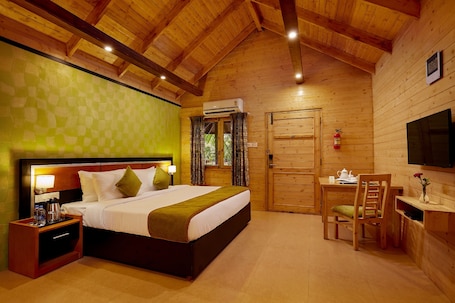 Premier Double Room | Minibar, in-room safe, desk, blackout drapes. Sterling Anaikatti