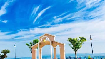 Seasonal outdoor pool, open 7:00 AM to 7:00 PM, pool umbrellas