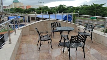 Grand Suite, Balcony, Pool View | Balcony