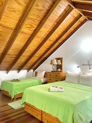 Standard Loft, Multiple Beds, Kitchenette, Garden View | Free WiFi, bed sheets - Bananaquit Apartments (Crown Point)