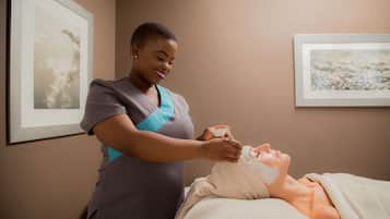 Expert therapists offer soothing treatments in a serene, stylish space with framed artwork.