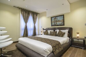 Suite Deluxe, 1 dormitori | Roba de llit d'alta qualitat i caixa forta a l'habitació 