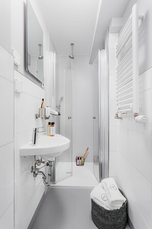 Shower, free toiletries, hair dryer, towels