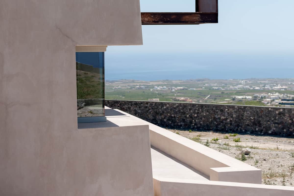 A modern architectural structure with a clear view of the landscape.