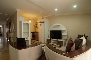 Apartment, 3 Bedrooms | Living room | LCD TV