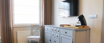 Desk, cribs/infant beds, rollaway beds, free WiFi