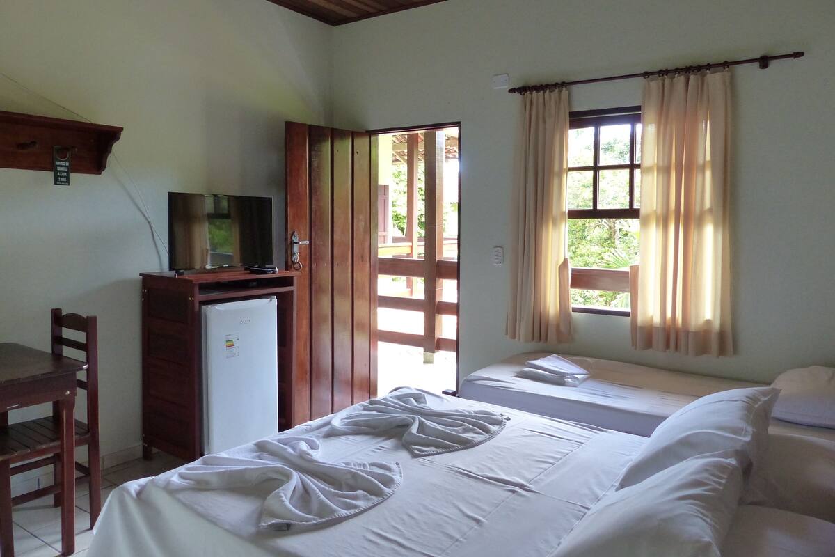 Triple Room | Minibar, blackout drapes