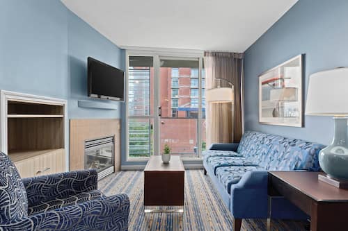 Deluxe Condo, 2 Bedrooms, Kitchen | Living area | TV, fireplace, DVD player