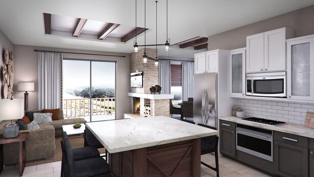 A modern kitchen with a large island, built-in appliances, and a balcony with a view. - WorldMark Marble Falls (Horseshoe Bay)