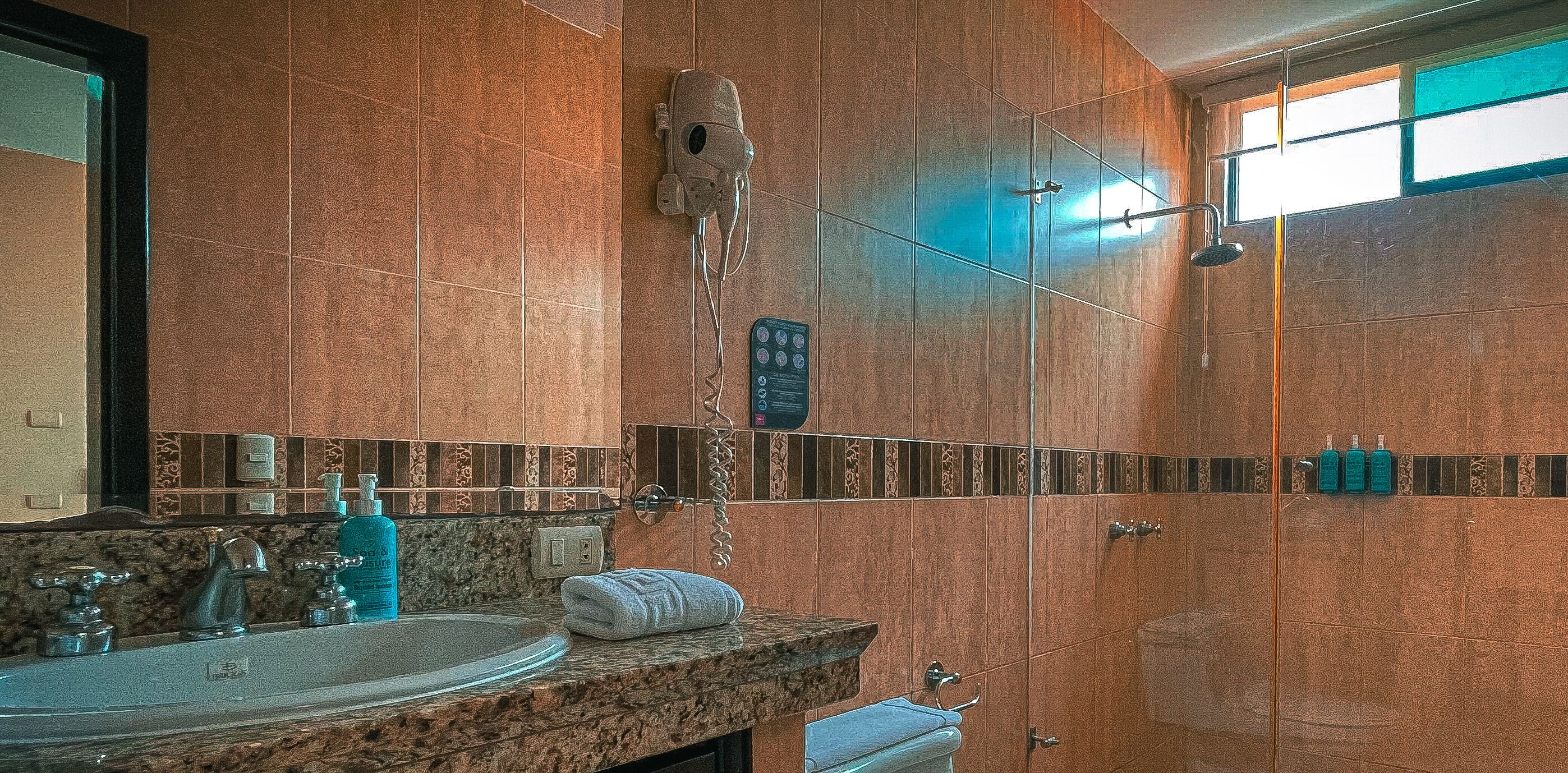 twin room, 2 single beds | bathroom | shower, free toiletries, slippers, towels