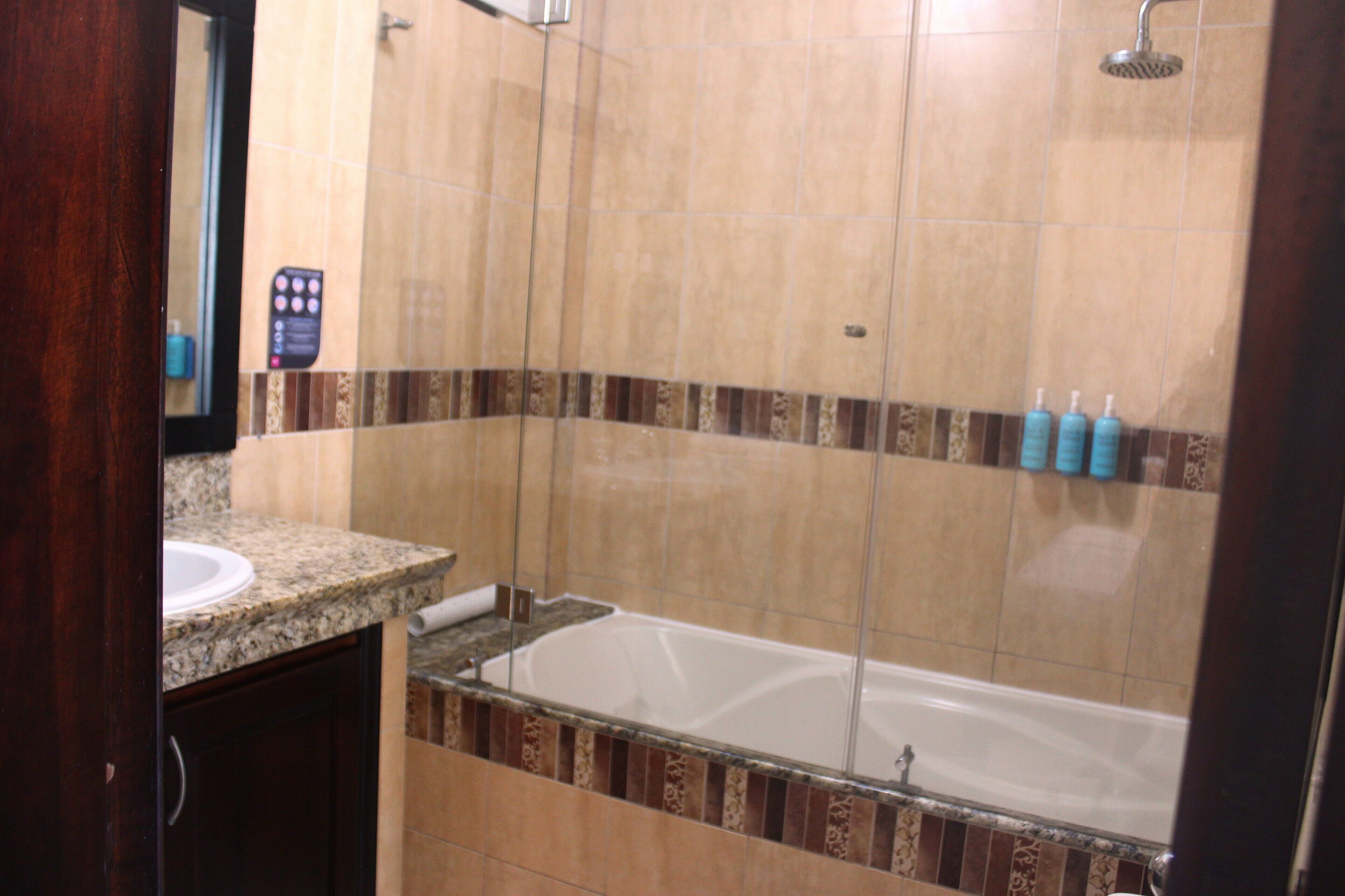 twin room, 2 single beds | bathroom | shower, free toiletries, slippers, towels