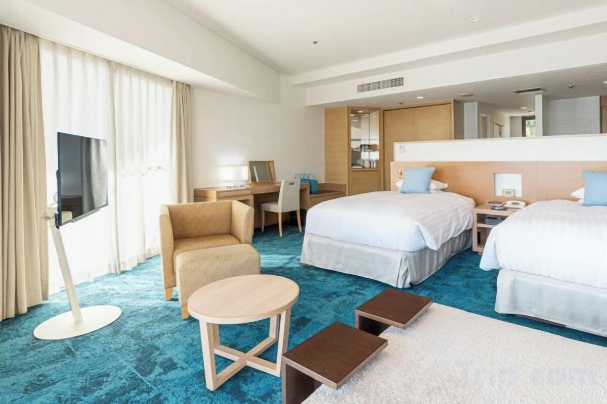 Luxe beddengoed, donsdekens, een kluis op de kamer