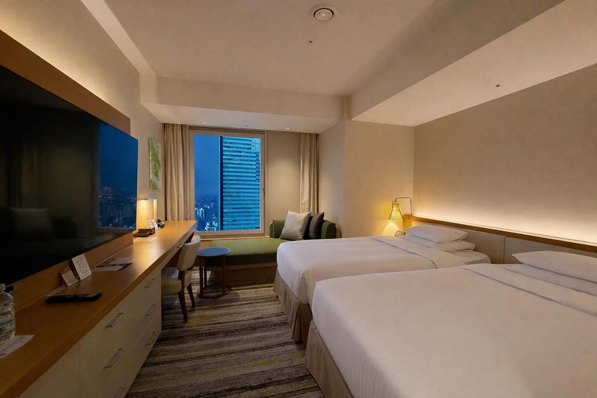 Deluxe Corner Twin Room, Non Smoking | In-room safe, desk, blackout curtains, iron/ironing board