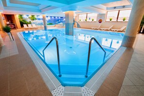 Indoor pool, open 8:00 AM to 9:00 PM, sun loungers, lifeguards on site