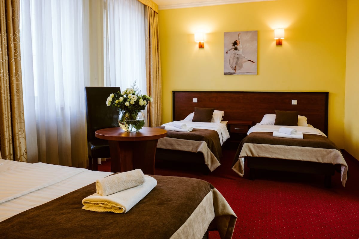 Quadruple Room | Desk, iron/ironing board, free WiFi, bed sheets