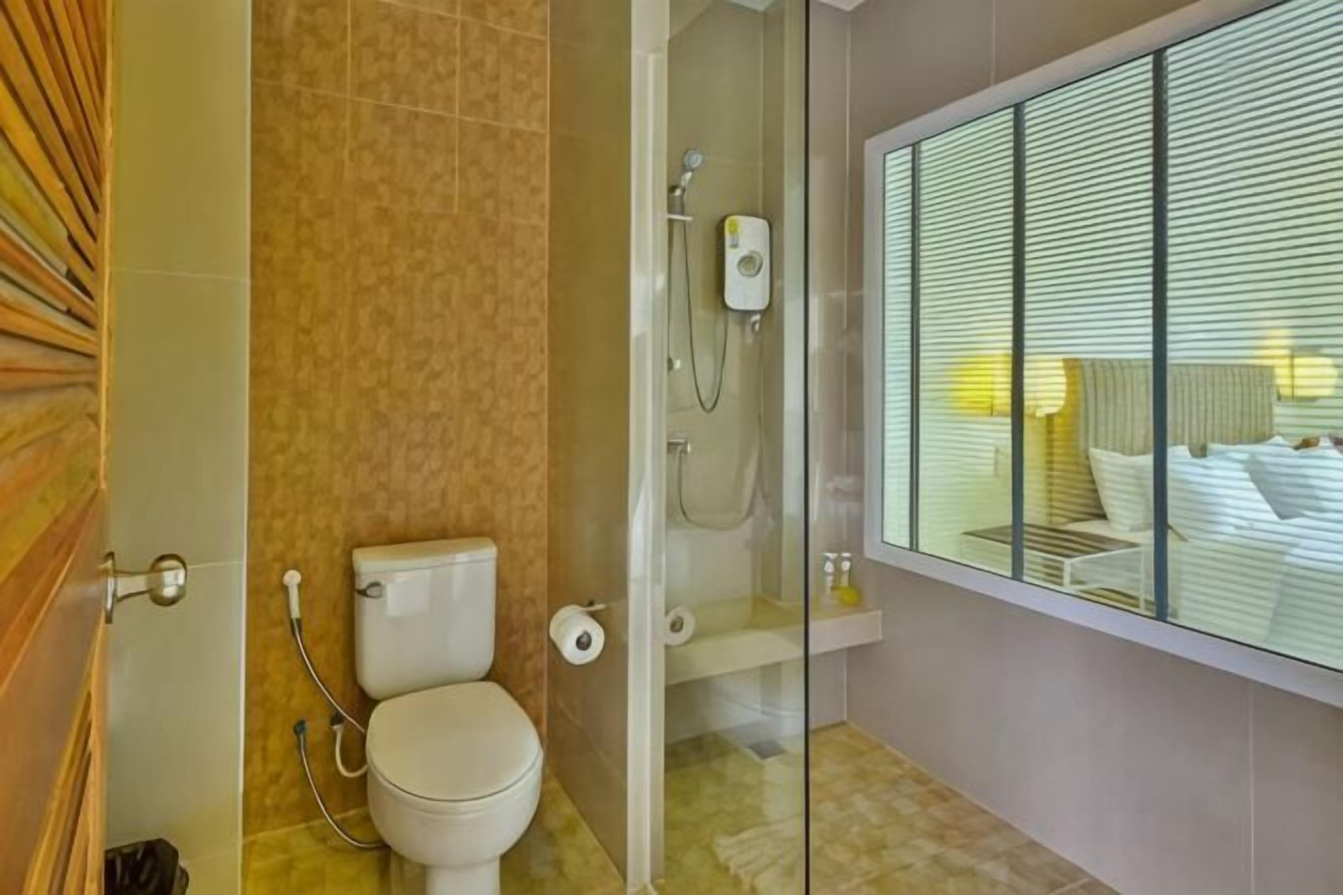 Shower, free toiletries, hair dryer, slippers