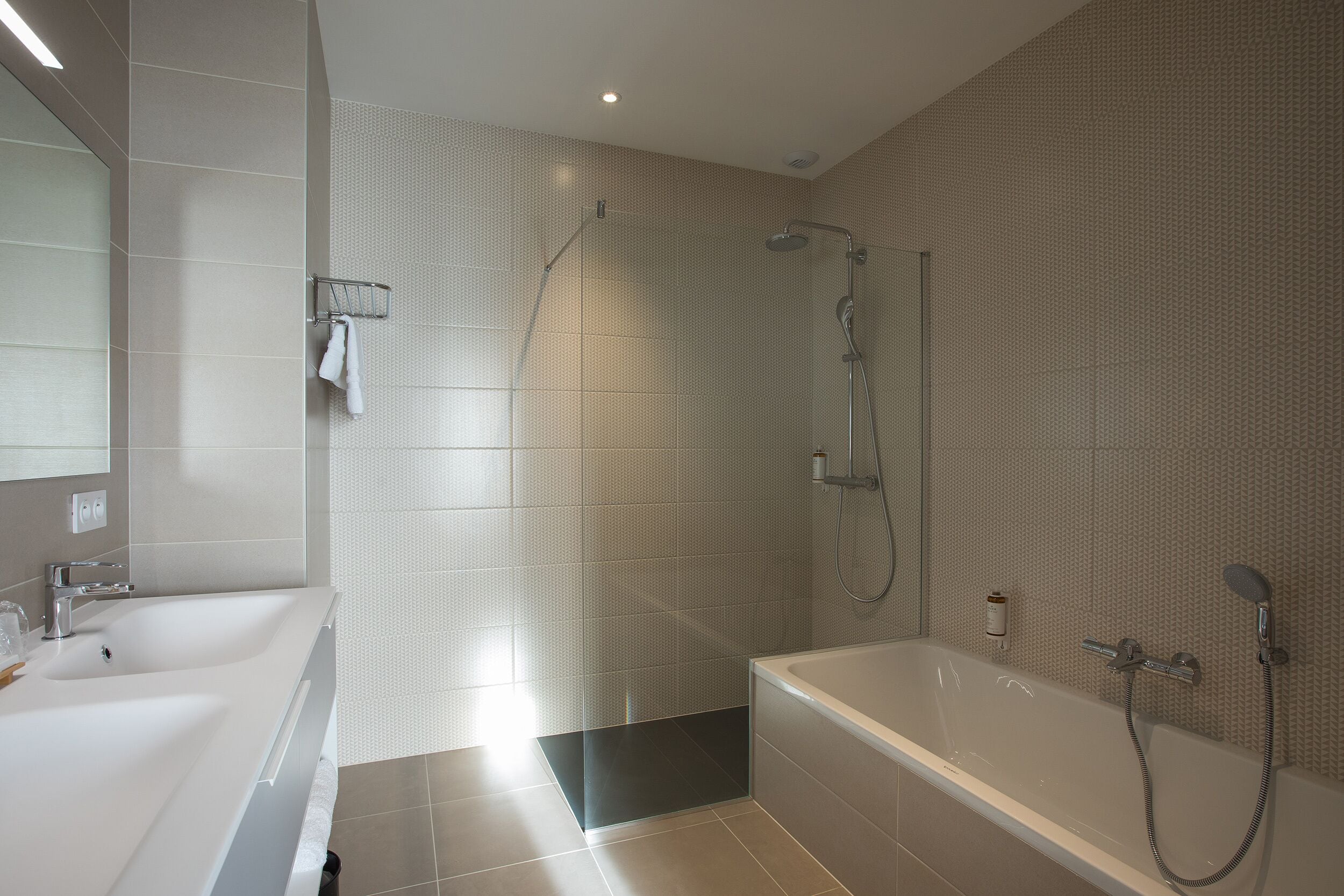 shower, free toiletries, hair dryer, towels