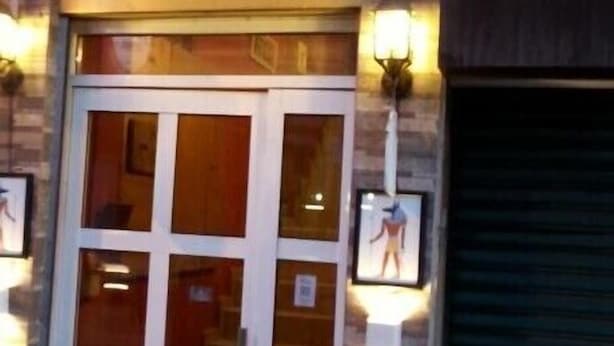 A hotel entrance with a sign reading "Hotel City Inn" and a visible door. - City Inn Hotel (Kuala Lumpur)