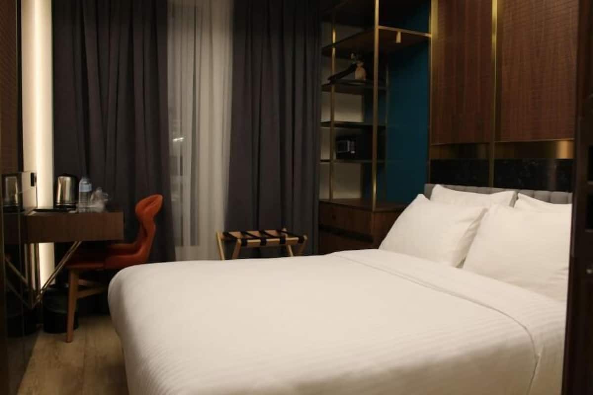 Literie hypoallergénique, minibar, coffres-forts dans les chambres