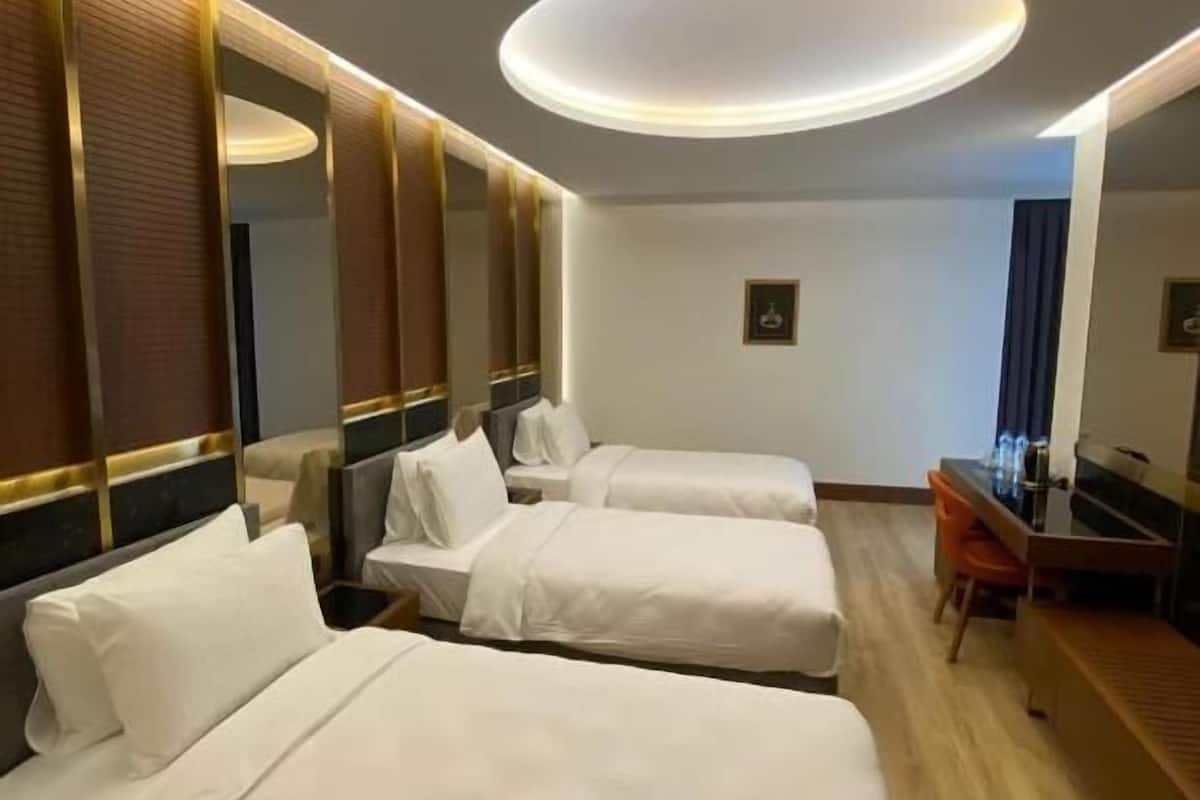 Premier Triple Room | Hypo-allergenic bedding, minibar, in-room safe, desk