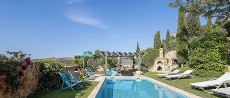 Outdoor pool, pool umbrellas, pool loungers