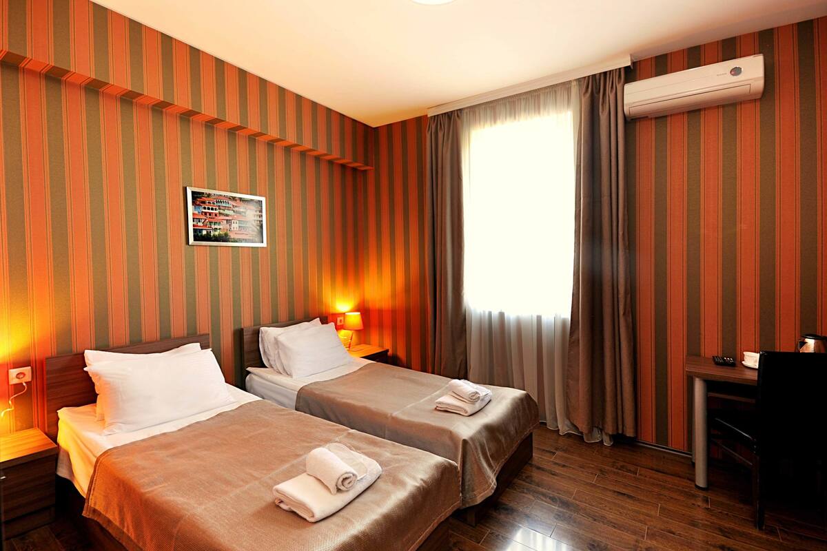 Camera Standard con letto matrimoniale o 2 letti singoli | 1 camera, una scrivania, postazione laptop, Wi-Fi gratuito