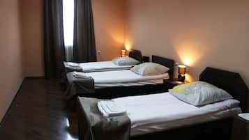 Economy Triple Room, Shared Bathroom | 1 bedroom, desk, laptop workspace, free WiFi