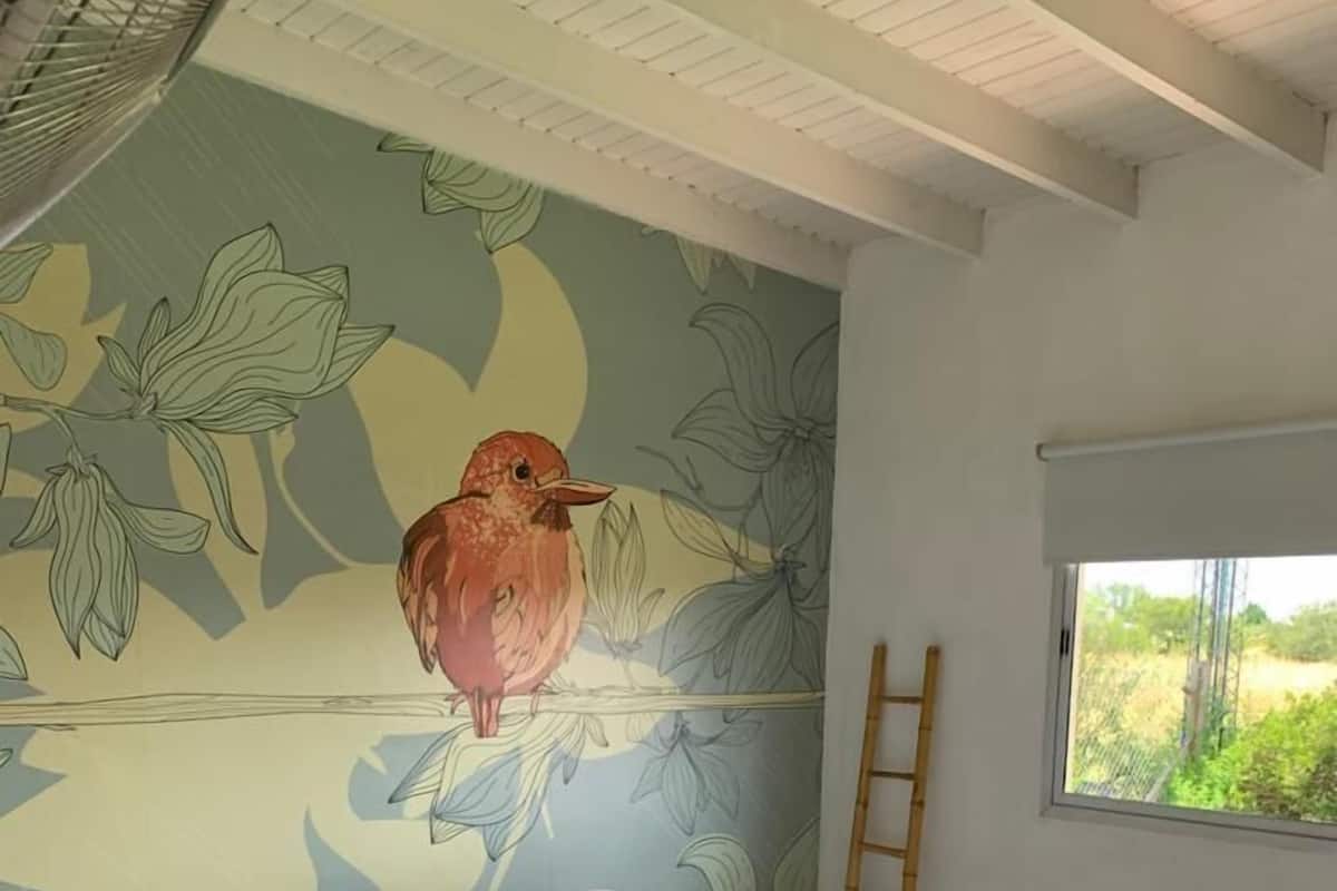 Cabin (Orange Bird) | Down comforters, blackout drapes, WiFi (free), individually decorated
