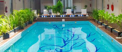 2 outdoor pools, open 9:00 AM to 9:00 PM, pool loungers