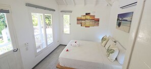 Deluxe Studio Suite, Pool View | Travel crib, free WiFi, bed sheets - El Pelicano Apart-Hotel (Las Galeras)