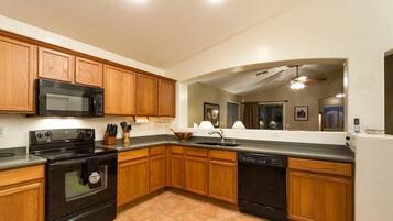Condo, 2 Bedrooms | Private kitchen | Fridge, microwave, stovetop, dishwasher