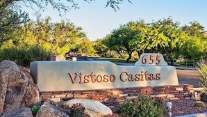 A sign for Vistoso Casitas with a number 655.
