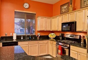 Condo, 3 Bedrooms | Private kitchen | Fridge, microwave, stovetop, dishwasher